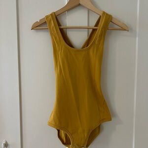 Arq Mustard tank bodysuit